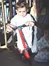Tuna with his new scooter. He calls it as "cici".